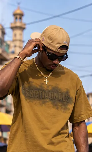Essentials Graphic Tee & Shorts Set — Mustard on a streetwear model